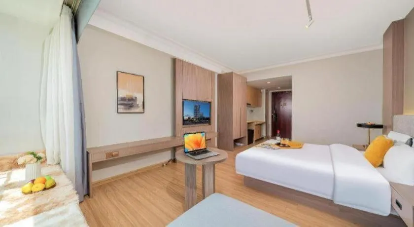 Bed in Poltton International Service Apartment Shanwei Urban District High-speed Railway Station