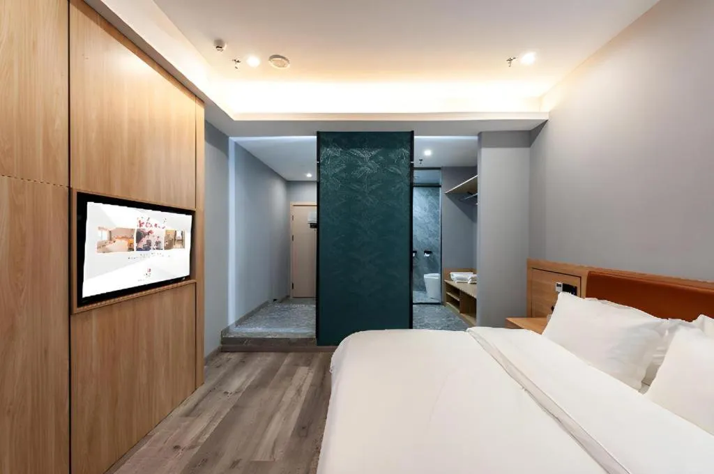 Bed in Borrman Hotel Jiangyin Zhouzhuang