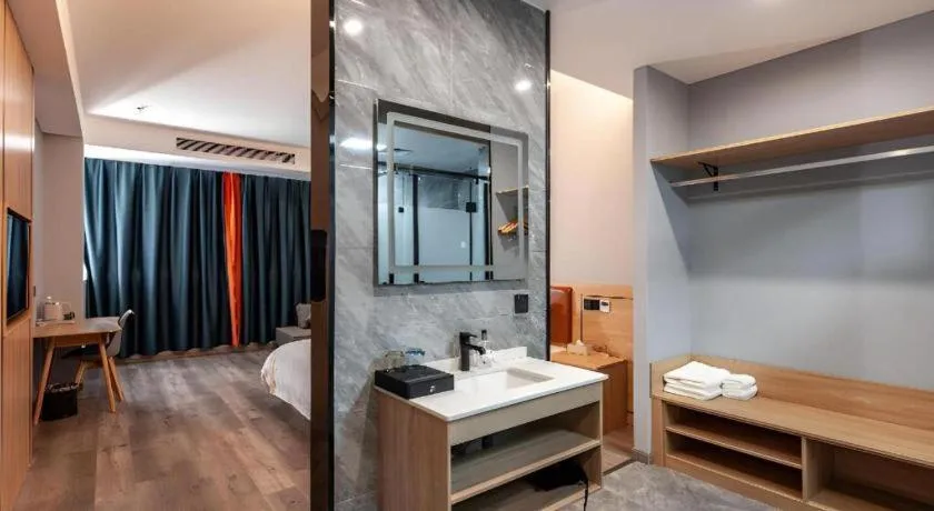 Bed in Borrman Hotel Jiangyin Zhouzhuang