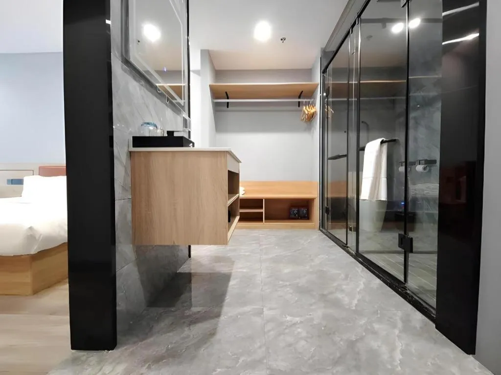 Bed in Borrman Hotel Jiangyin Zhouzhuang