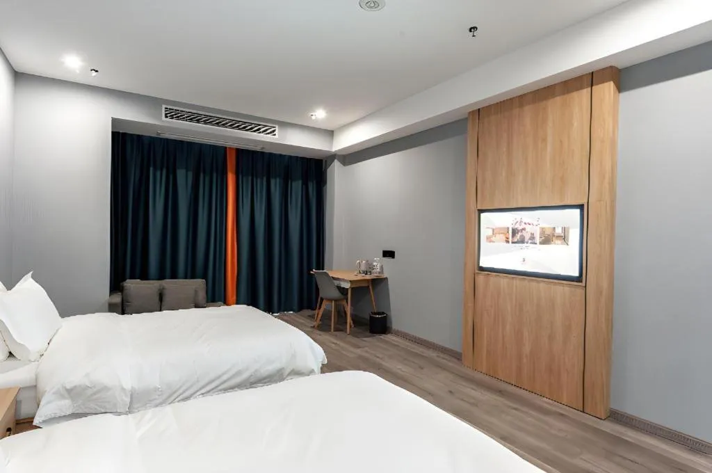 Bed in Borrman Hotel Jiangyin Zhouzhuang