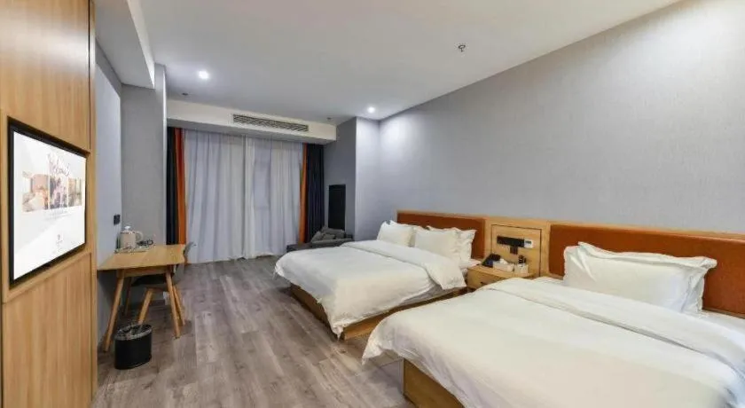 Bed in Borrman Hotel Jiangyin Zhouzhuang