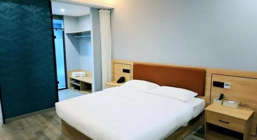 Bed in Borrman Hotel Jiangyin Zhouzhuang