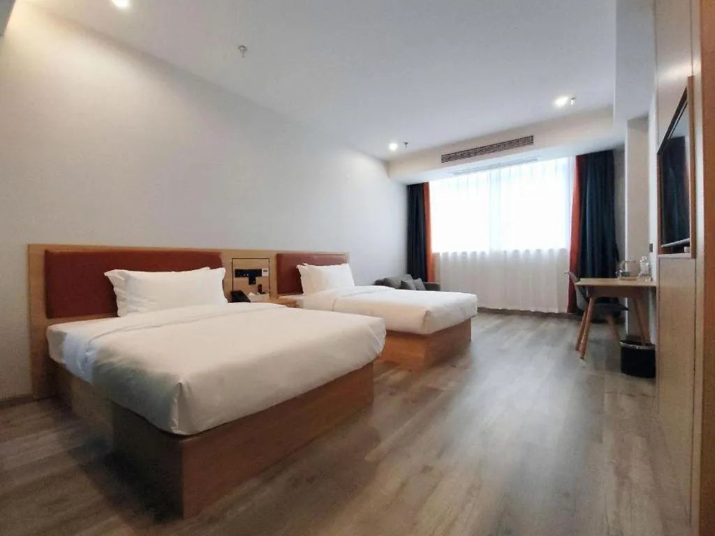 Bed in Borrman Hotel Jiangyin Zhouzhuang