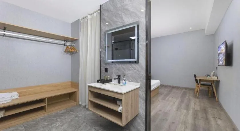 Bed in Borrman Hotel Jiangyin Zhouzhuang