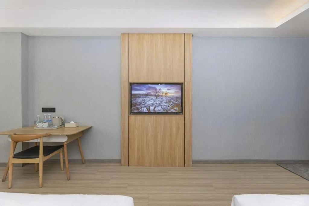 Bed in Borrman Hotel Jiangyin Zhouzhuang