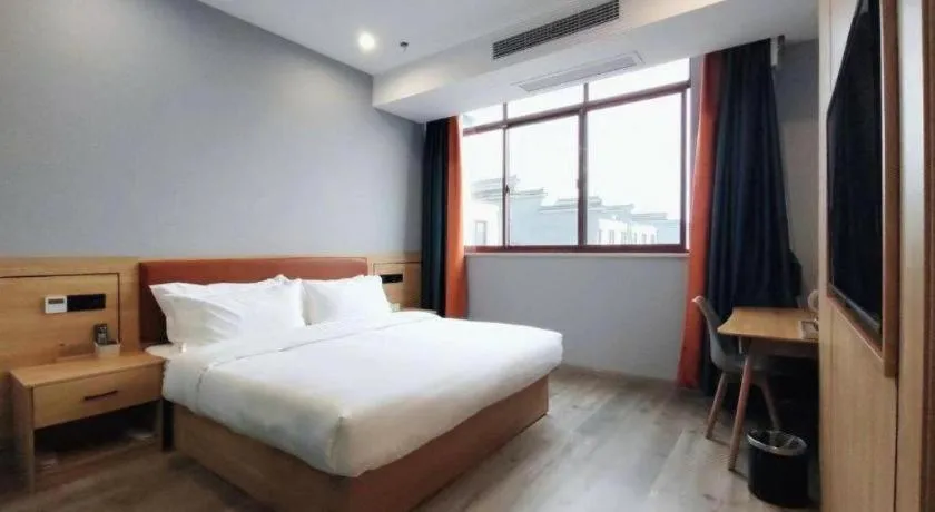 Bed in Borrman Hotel Jiangyin Zhouzhuang