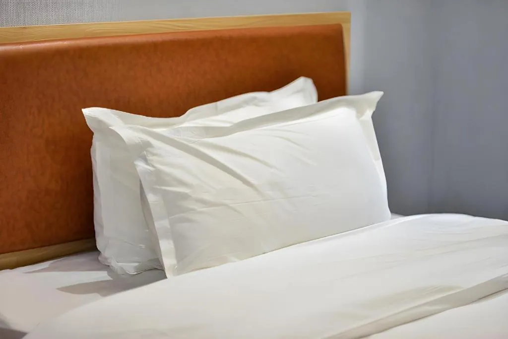 Bed in Borrman Hotel Jiangyin Zhouzhuang