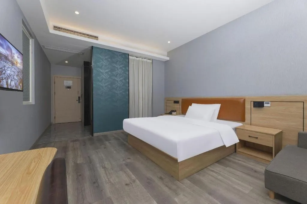 Bed in Borrman Hotel Jiangyin Zhouzhuang