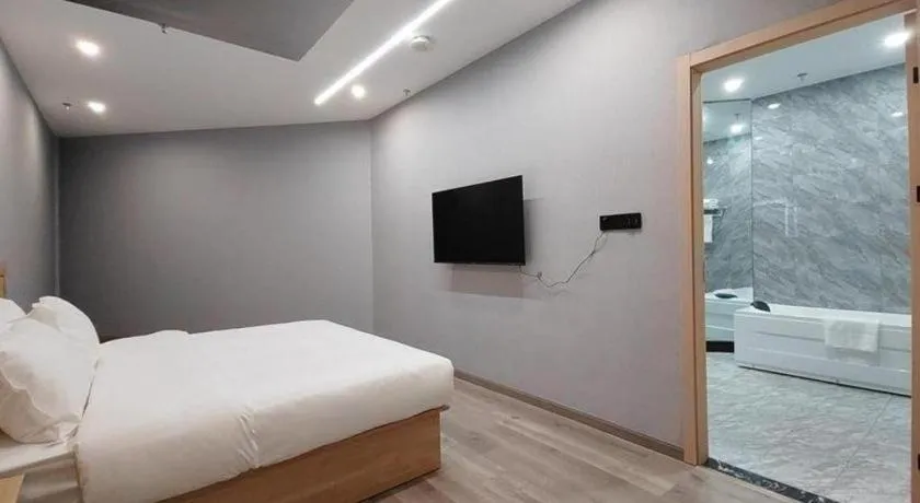 Bed in Borrman Hotel Jiangyin Zhouzhuang