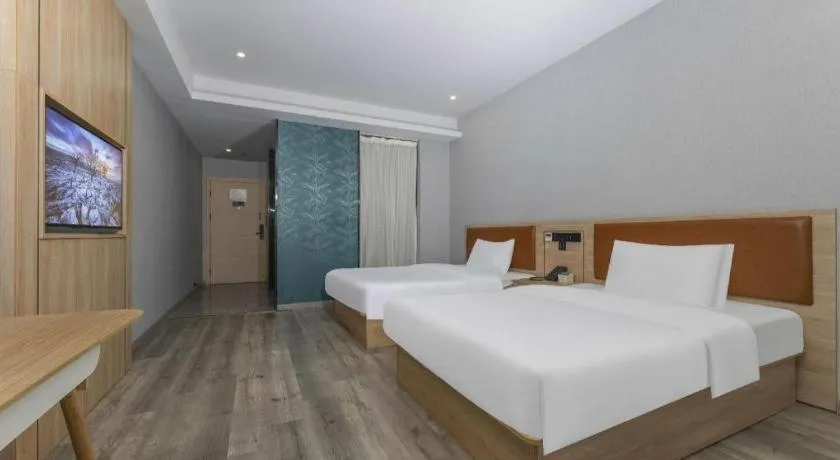 Bed in Borrman Hotel Jiangyin Zhouzhuang