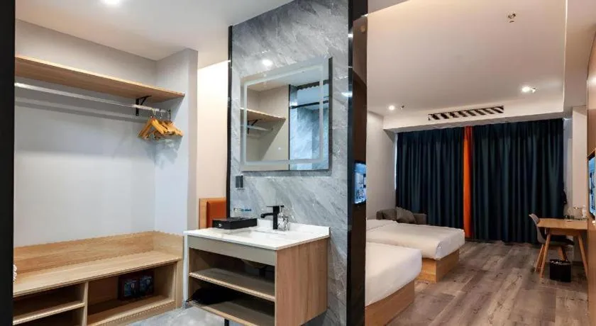 Bed in Borrman Hotel Jiangyin Zhouzhuang