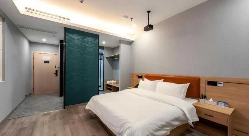 Bed in Borrman Hotel Jiangyin Zhouzhuang