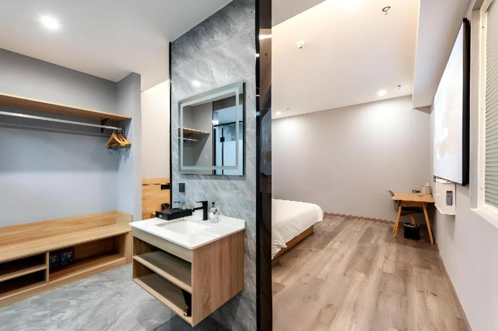 Bed in Borrman Hotel Jiangyin Zhouzhuang