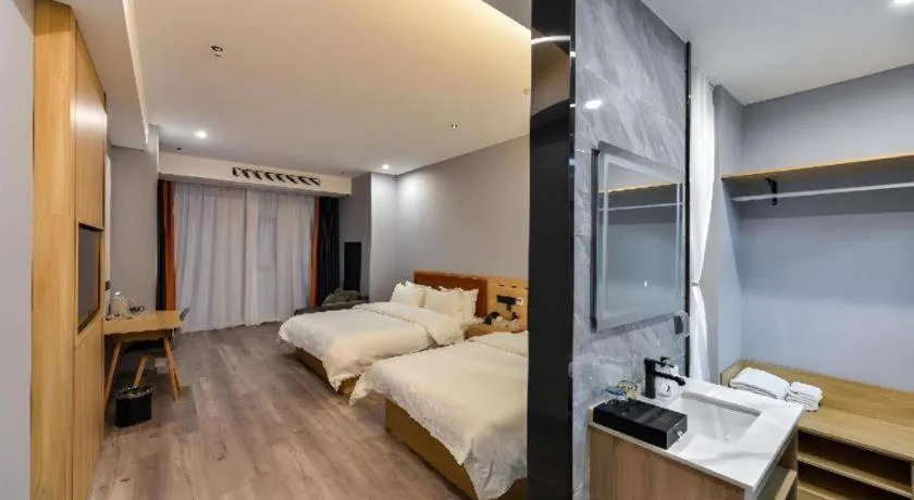 Bed in Borrman Hotel Jiangyin Zhouzhuang