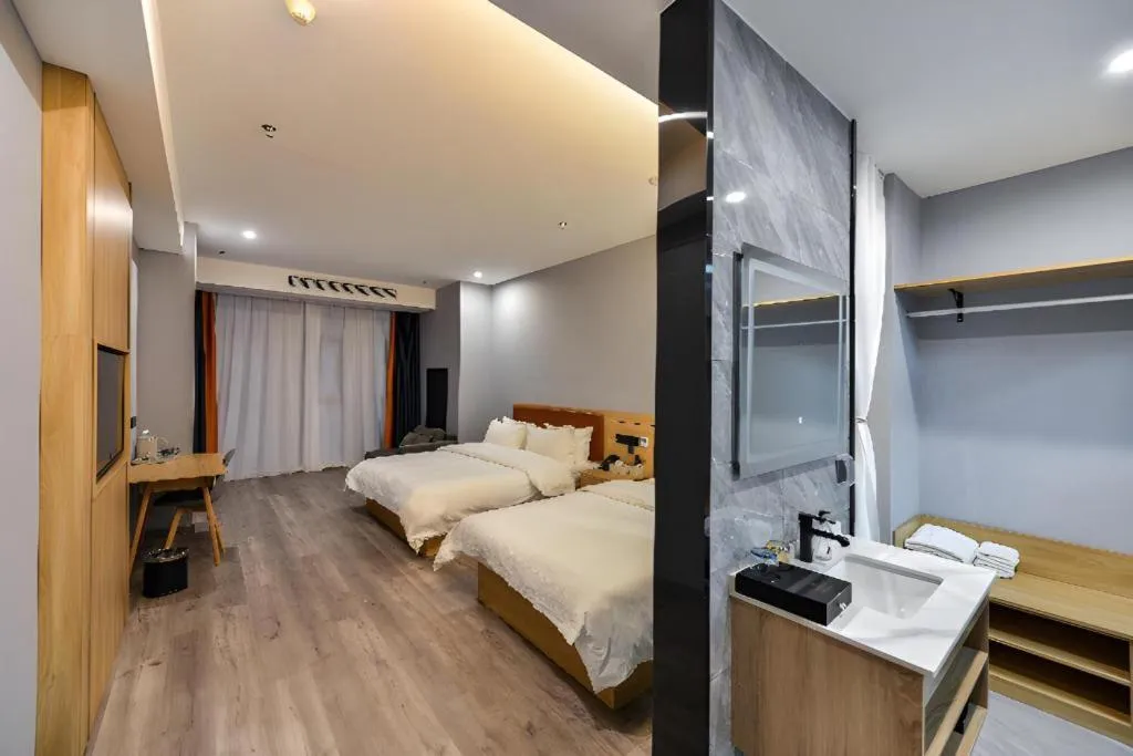 Bed in Borrman Hotel Jiangyin Zhouzhuang