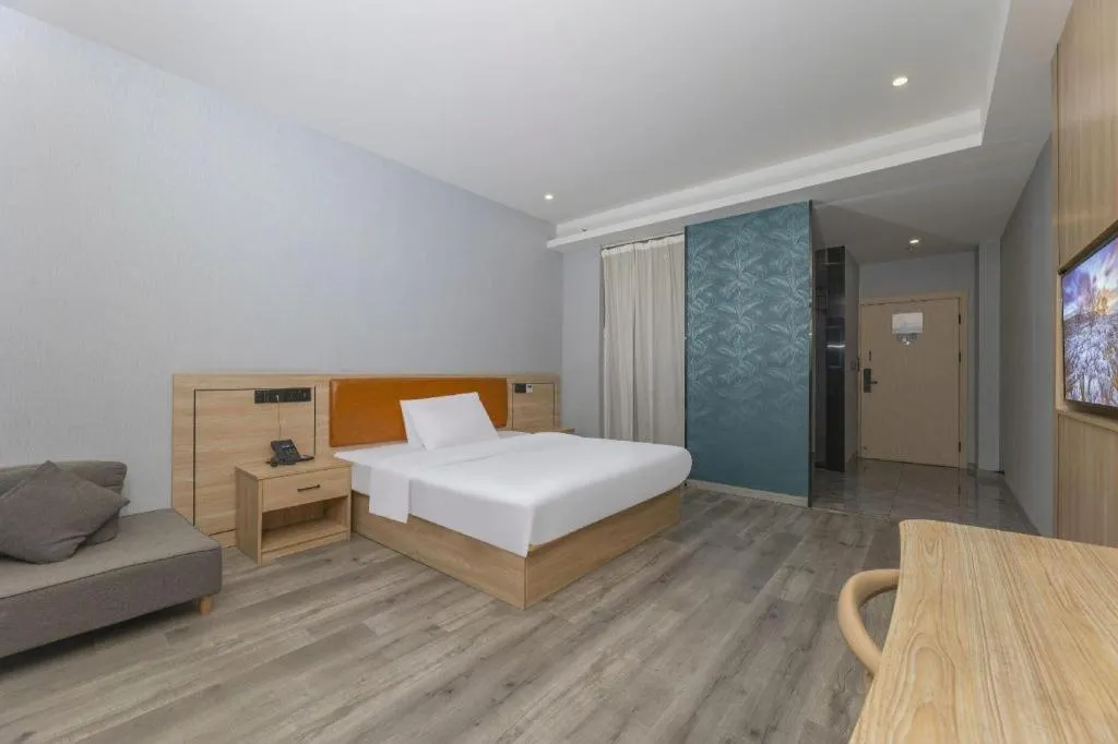 Bed in Borrman Hotel Jiangyin Zhouzhuang