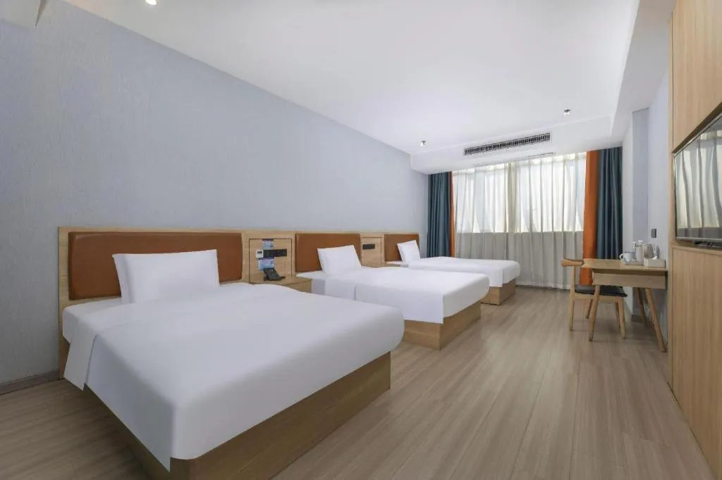 Bed in Borrman Hotel Jiangyin Zhouzhuang