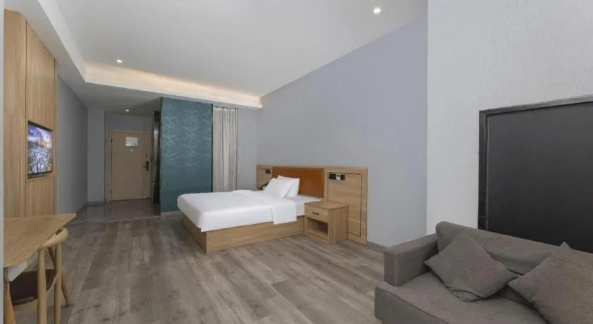 Bed in Borrman Hotel Jiangyin Zhouzhuang