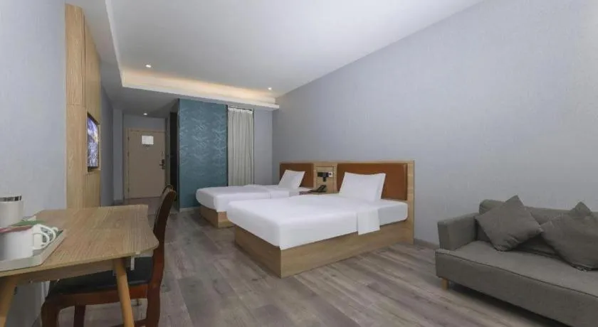 Bed in Borrman Hotel Jiangyin Zhouzhuang