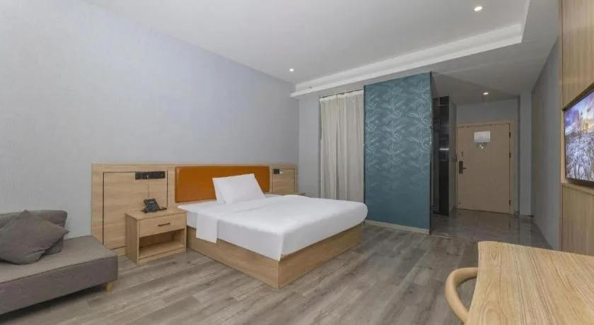 Bed in Borrman Hotel Jiangyin Zhouzhuang