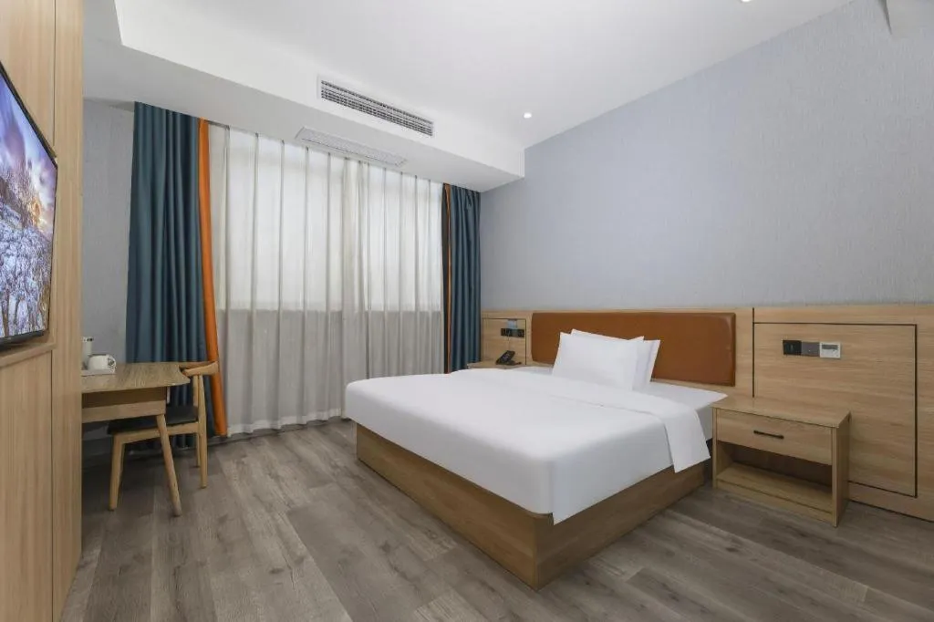 Bed in Borrman Hotel Jiangyin Zhouzhuang