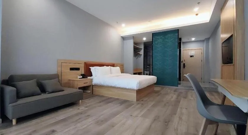 Bed in Borrman Hotel Jiangyin Zhouzhuang