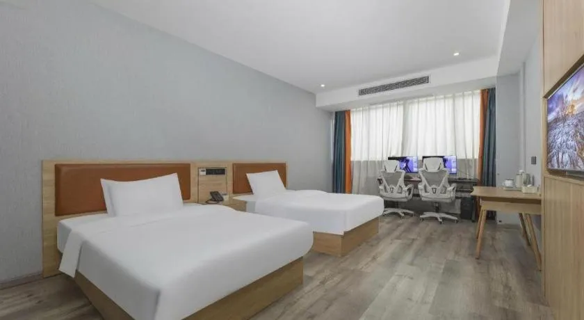 Bed in Borrman Hotel Jiangyin Zhouzhuang