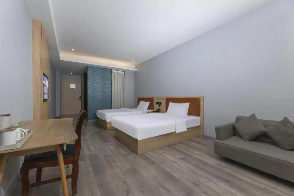 Bed in Borrman Hotel Jiangyin Zhouzhuang