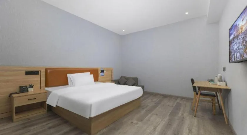 Bed in Borrman Hotel Jiangyin Zhouzhuang