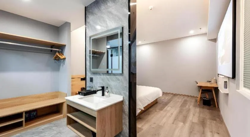 Bed in Borrman Hotel Jiangyin Zhouzhuang