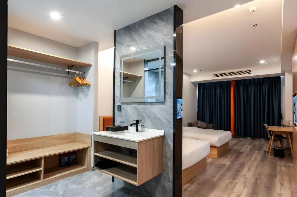 Bed in Borrman Hotel Jiangyin Zhouzhuang