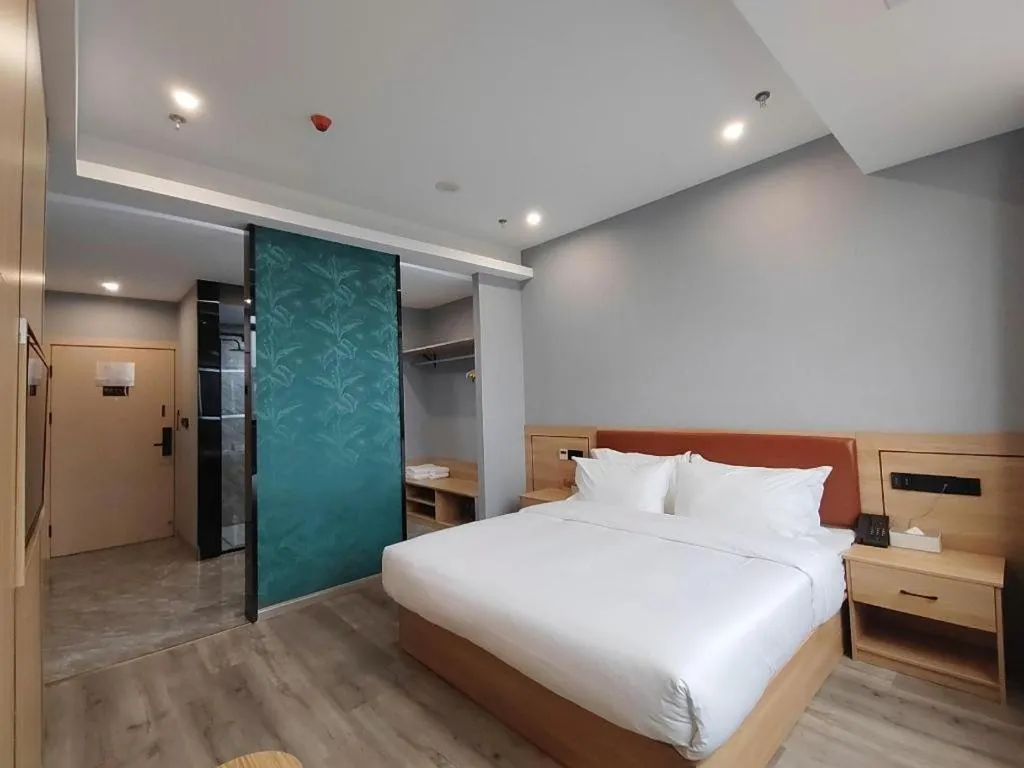 Bed in Borrman Hotel Jiangyin Zhouzhuang