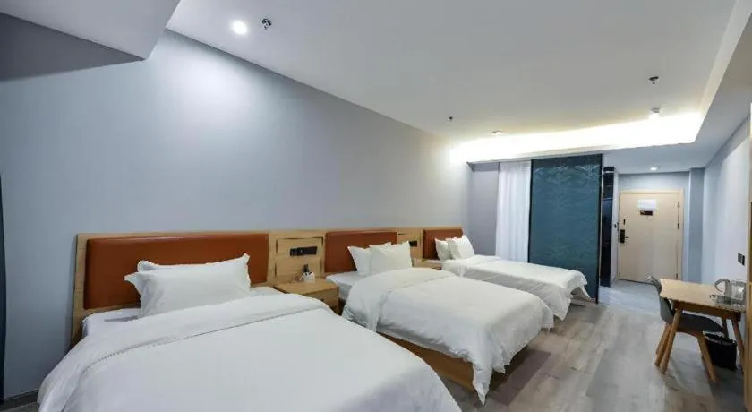 Bed in Borrman Hotel Jiangyin Zhouzhuang