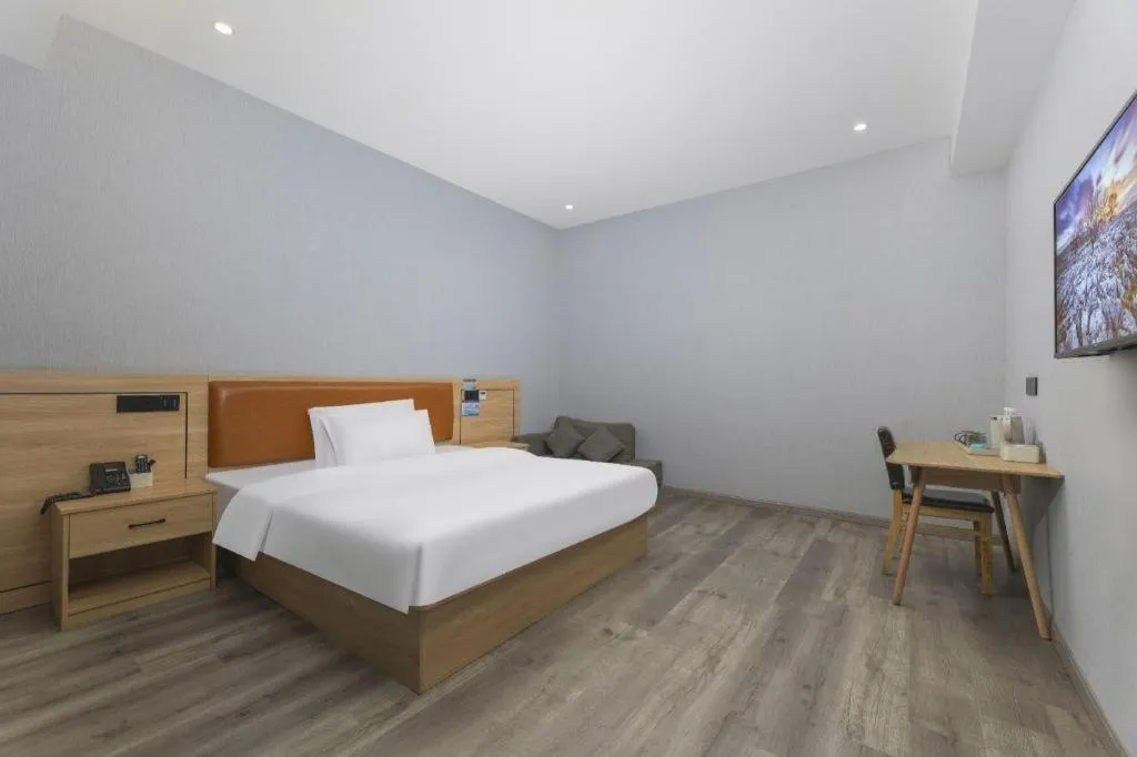 Bed in Borrman Hotel Jiangyin Zhouzhuang