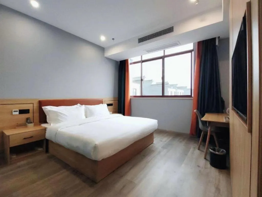 Bed in Borrman Hotel Jiangyin Zhouzhuang