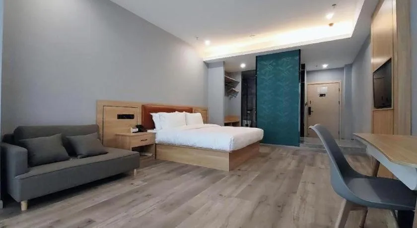 Bed in Borrman Hotel Jiangyin Zhouzhuang