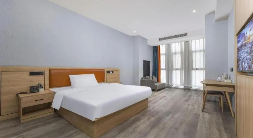 Bed in Borrman Hotel Jiangyin Zhouzhuang