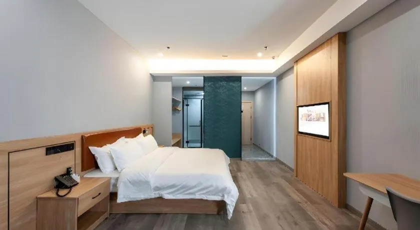 Bed in Borrman Hotel Jiangyin Zhouzhuang