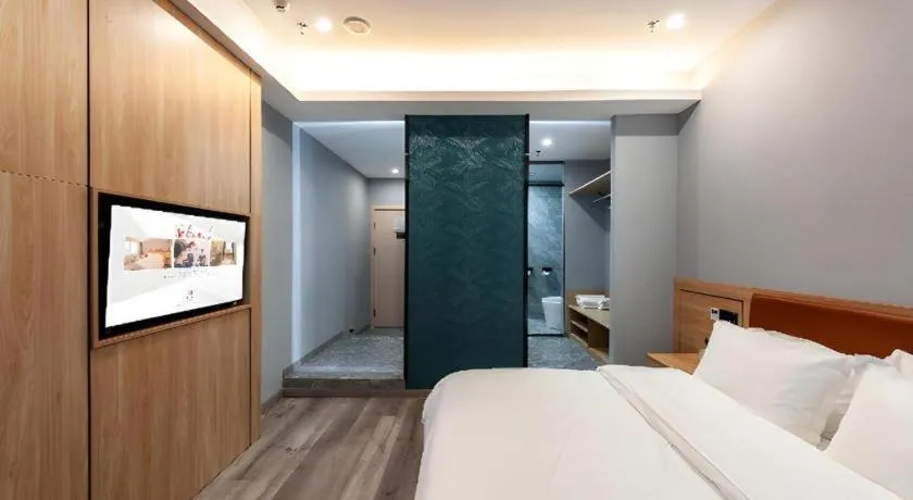 Bed in Borrman Hotel Jiangyin Zhouzhuang