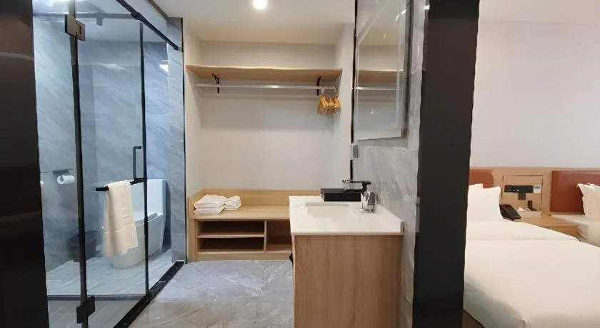 Bed in Borrman Hotel Jiangyin Zhouzhuang