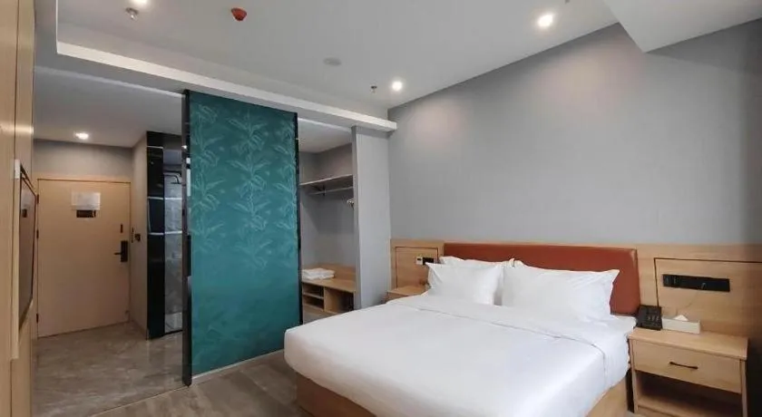 Bed in Borrman Hotel Jiangyin Zhouzhuang