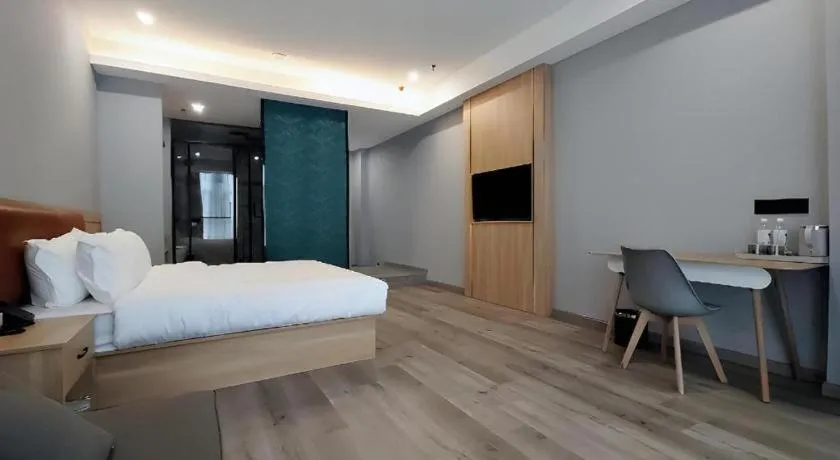 Bed in Borrman Hotel Jiangyin Zhouzhuang