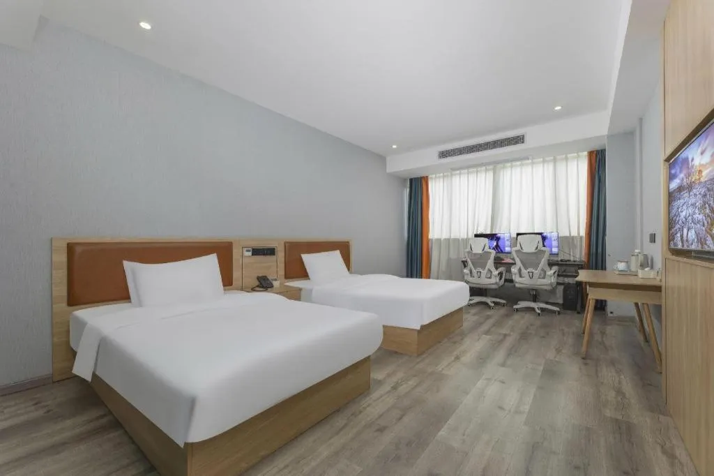 Bed in Borrman Hotel Jiangyin Zhouzhuang