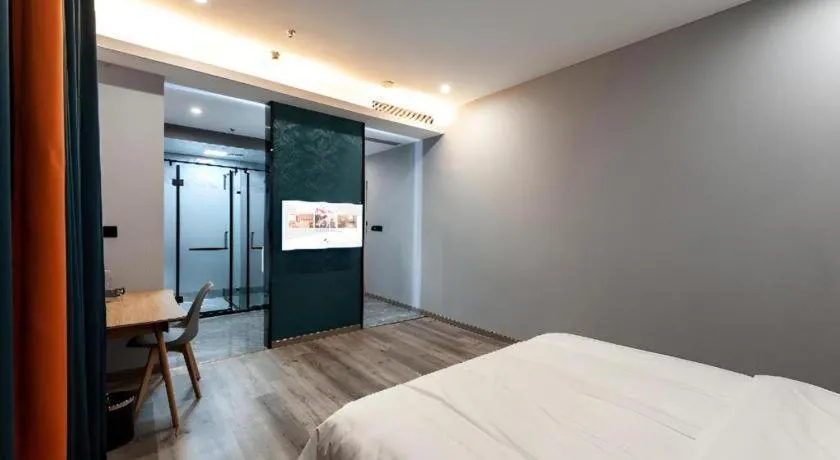 Bed in Borrman Hotel Jiangyin Zhouzhuang