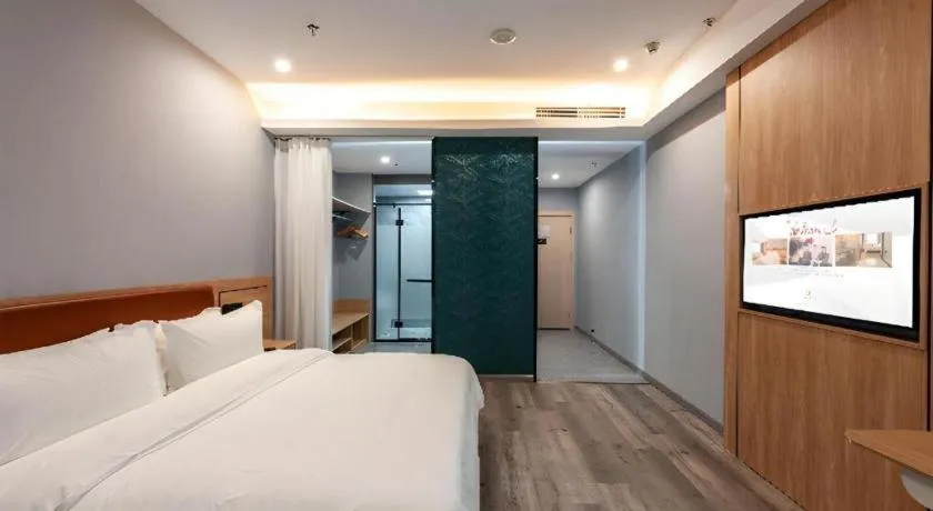 Bed in Borrman Hotel Jiangyin Zhouzhuang