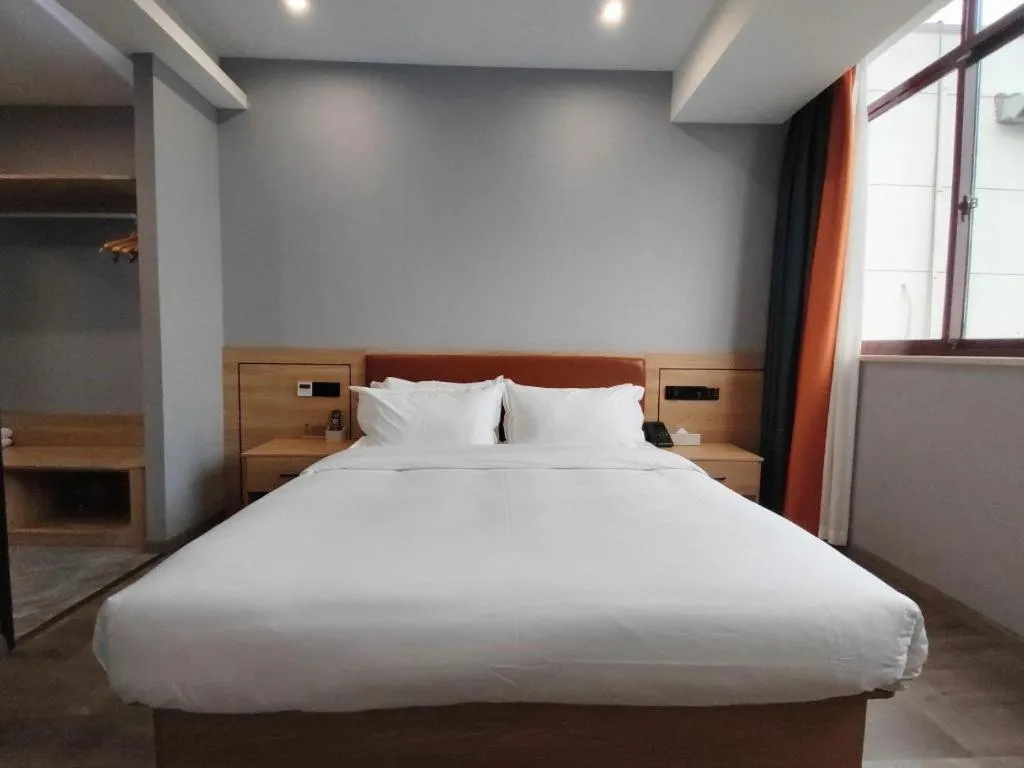 Bed in Borrman Hotel Jiangyin Zhouzhuang