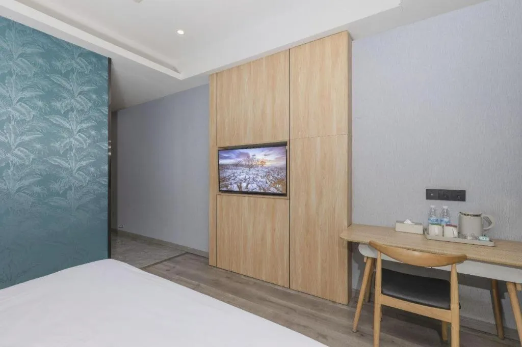 Bed in Borrman Hotel Jiangyin Zhouzhuang