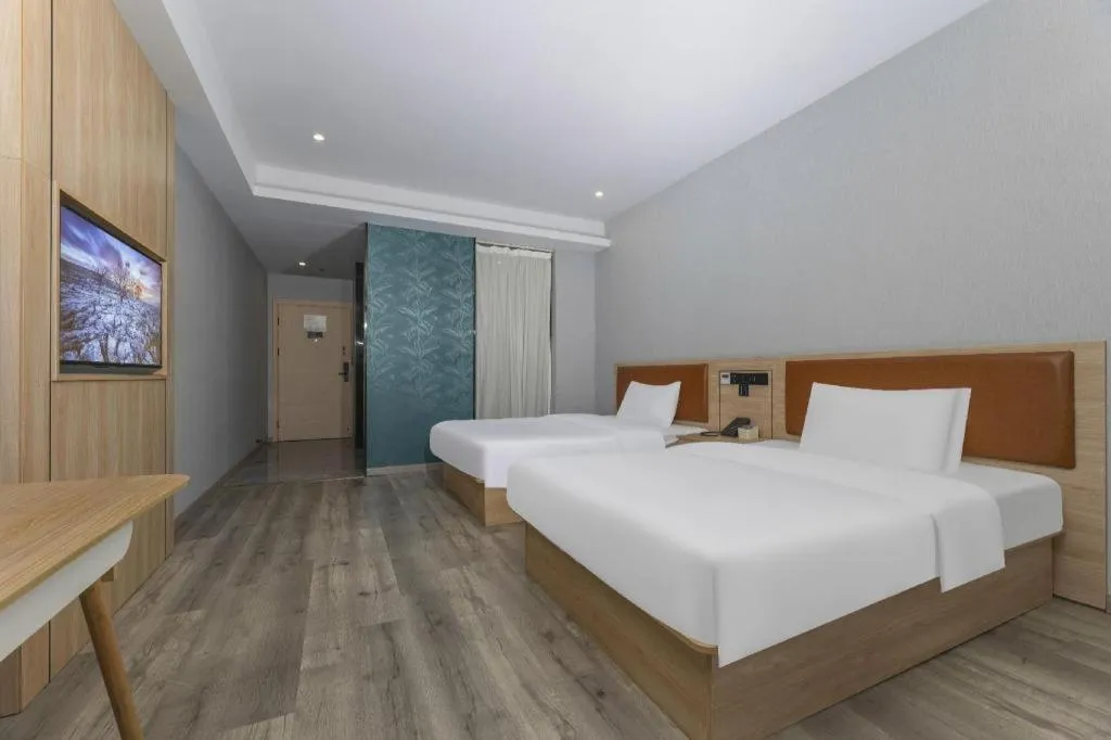 Bed in Borrman Hotel Jiangyin Zhouzhuang