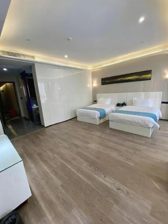 Bed in Echarm Hotel Wuhan Wusheng Road Metro Station Cade Square